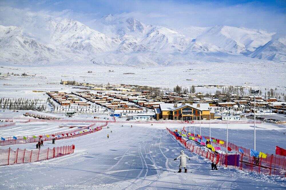 雪运动成就新疆文旅新名片开元ky棋牌新华全媒+冰(图2)