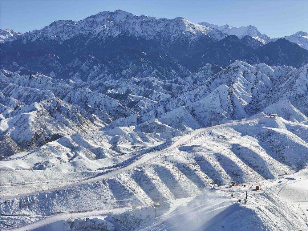 雪运动成就新疆文旅新名片开元ky棋牌新华全媒+冰(图11)